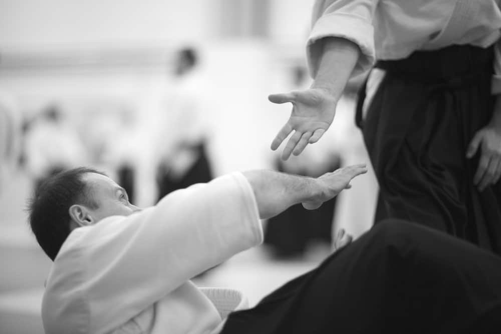 Helping hand aikido concept